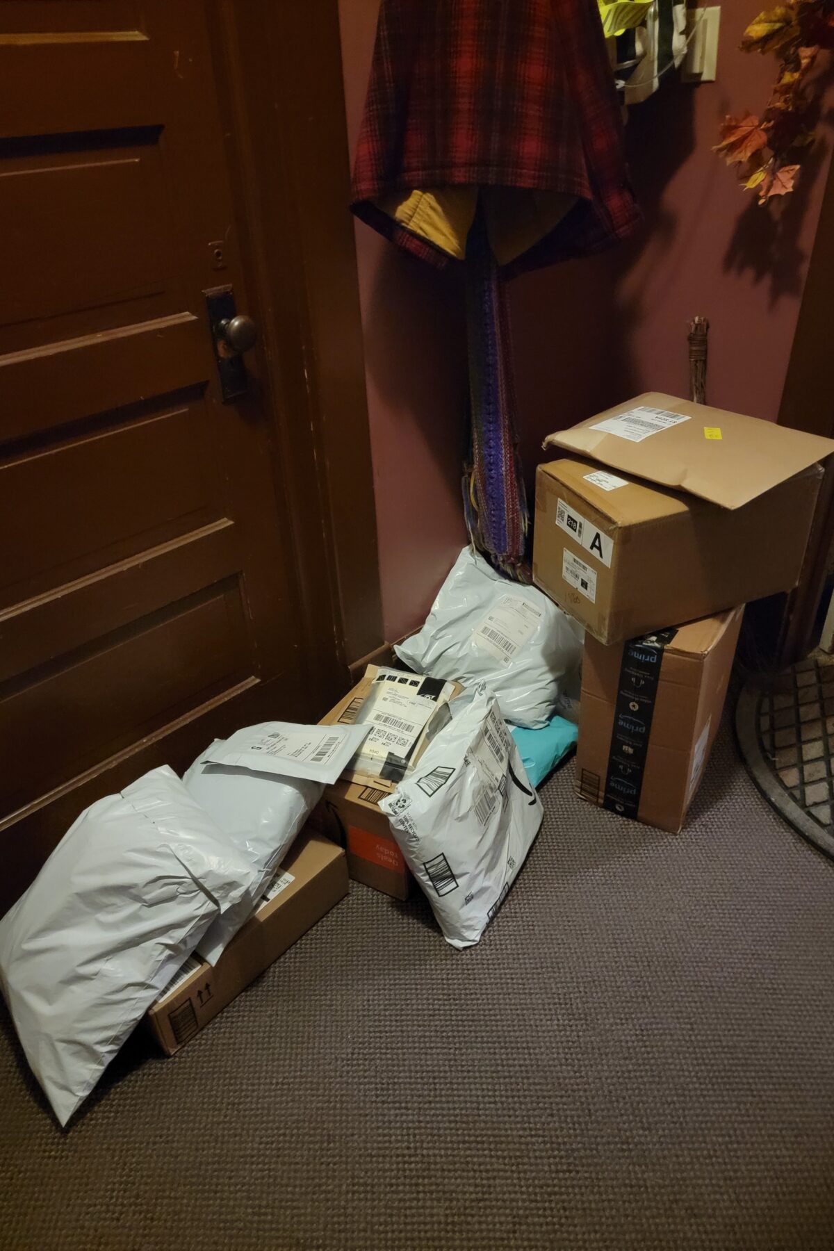 Pile of packages in a hallway