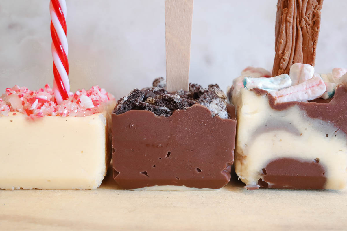 Three different flavors of homemade hot cocoa spoons.