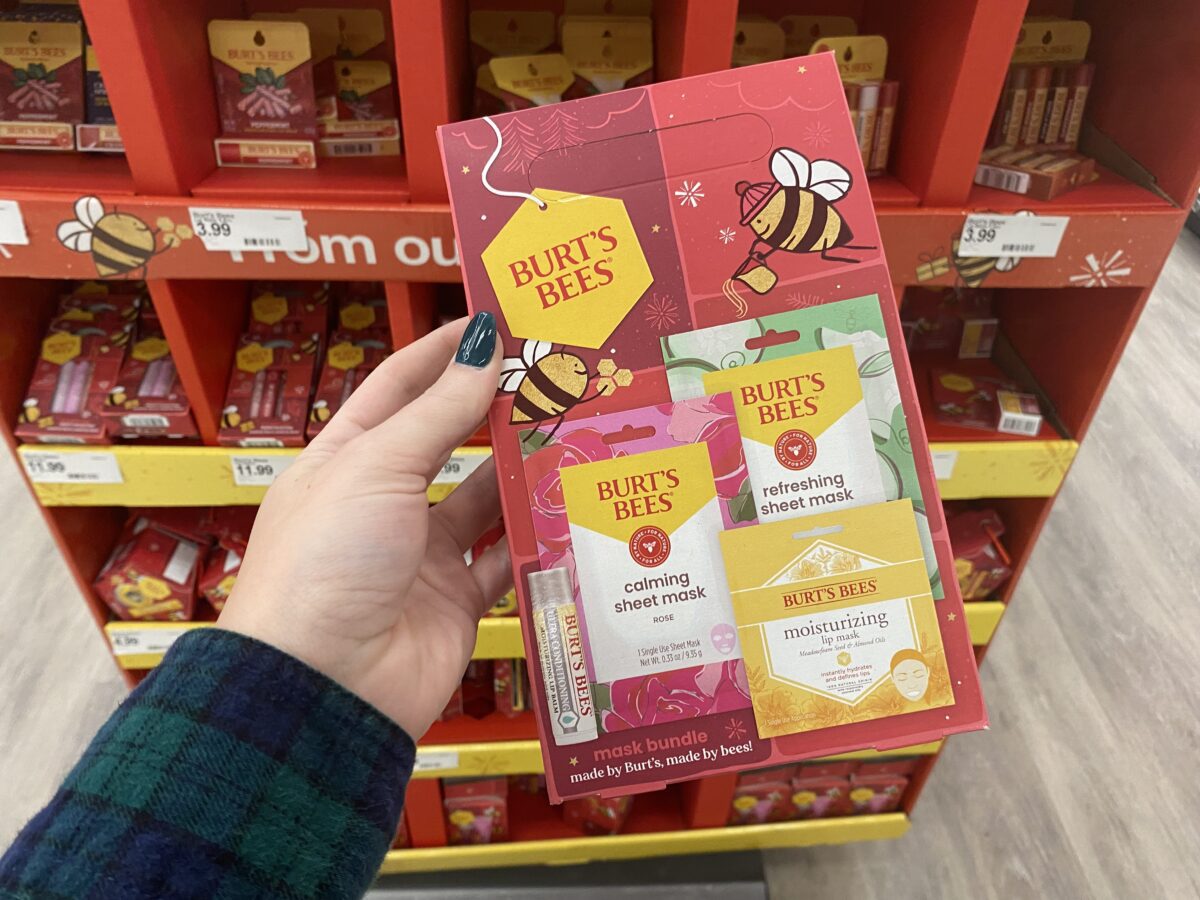 woman's hand holding a Burt's Bees gift set