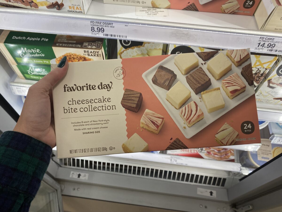 Woman's hand holding a cheesecake bite collection