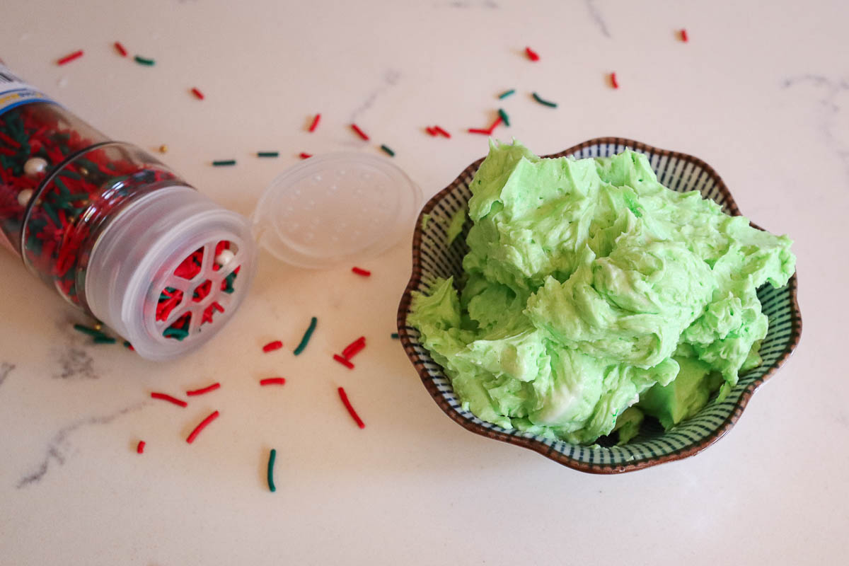 Green icing and red and green jimmies