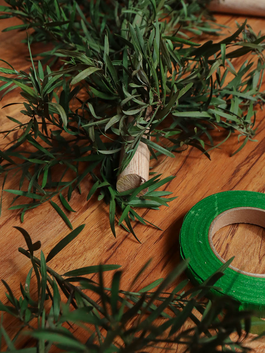 Foliage attached to wood dowel